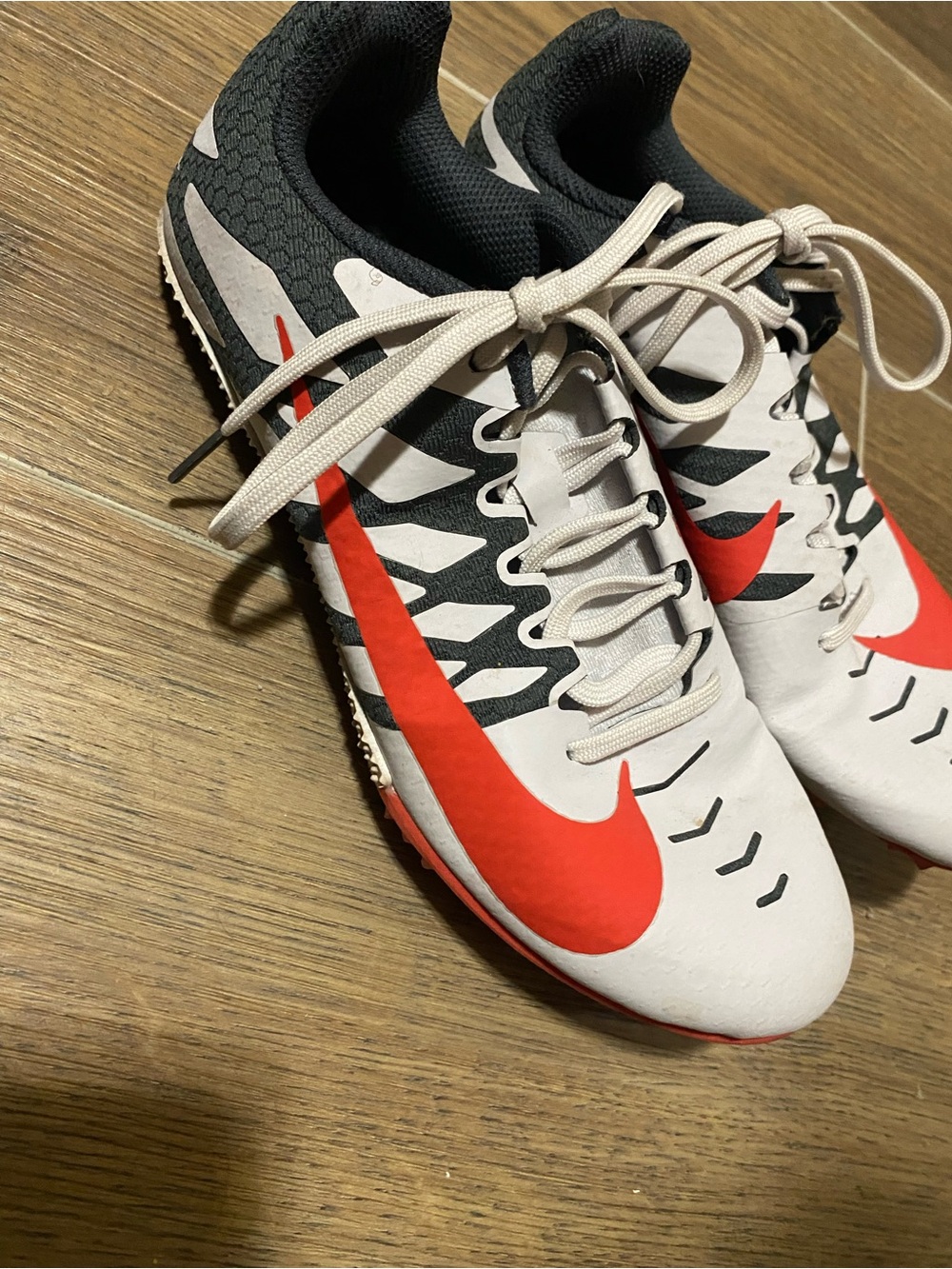 Nike White and Red Soccer Shoes with Black Accents